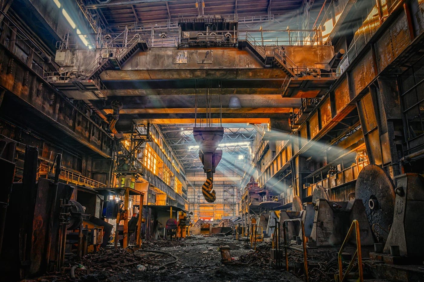 An overhead crane hook in a heavy steel works