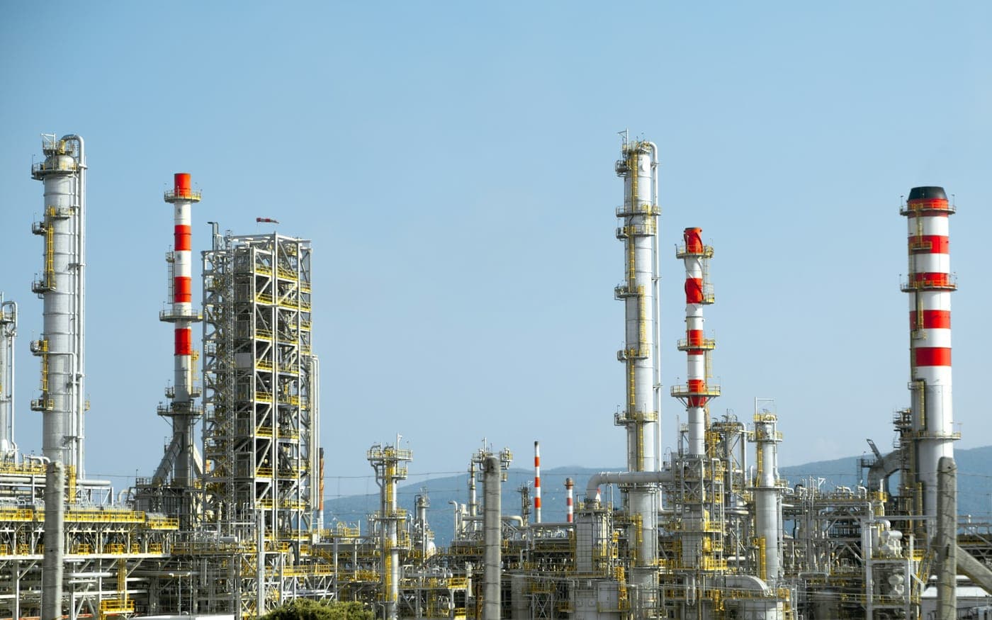 A refinery with distillation towers and stacks